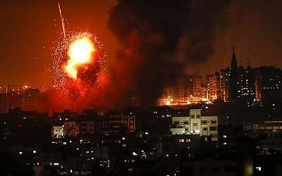 Illustrative: A picture taken on August 8, 2018, shows an Israeli airstrike on Gaza City. (AFP Photo/Mahmud Hams)
