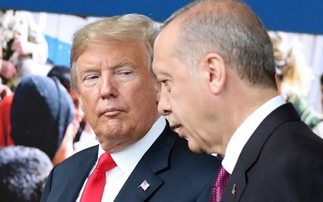 US President Donald Trump (L) talks to Turkey's President Recep Tayyip Erdogan (R) as they arrive for the NATO summit, at the NATO headquarters in Brussels, July 11, 2018. (Tatyana ZENKOVICH/AFP) US President Donald Trump (L) talks to Turkey's President Recep Tayyip Erdogan (R) as they arrive for the NATO summit, at the NATO headquarters in Brussels, July 11, 2018. (Tatyana ZENKOVICH/AFP)