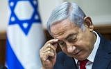 Prime Minister Benjamin Netanyahu attends the weekly cabinet meeting at his office in Jerusalem on August 12, 2018. (AFP Photo/Pool/Jim Hollander)