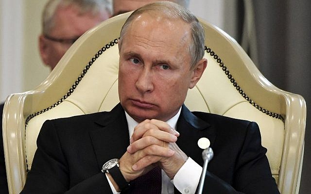 Russian President Vladimir Putin attends the plenary session at the 5th Caspian Summit in Aktau on August 12, 2018. (AFP PHOTO / Sputnik / Alexey NIKOLSKY) Russian President Vladimir Putin attends the plenary session at the 5th Caspian Summit in Aktau on August 12, 2018. (AFP PHOTO / Sputnik / Alexey NIKOLSKY)