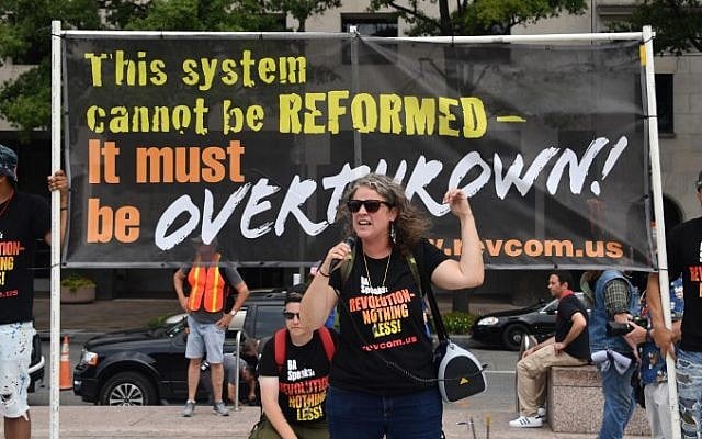 Demonstrators opposed to a far-right rally to be held near the White House gather August 12, 2018 in Washington, DC, one year after deadly violence at a similar protest in Charlottesville, Virginia. (AFP PHOTO / Nicholas Kamm) Demonstrators opposed to a far-right rally to be held near the White House gather August 12, 2018 in Washington, DC, one year after deadly violence at a similar protest in Charlottesville, Virginia. (AFP PHOTO / Nicholas Kamm)