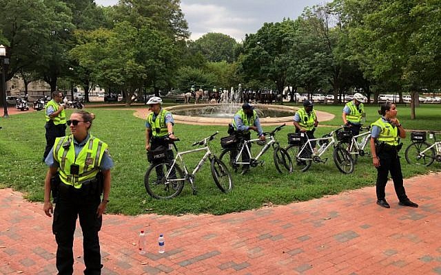 Police oversee the Unite the Right rally August 12, 2018 in Washington, DC on the one-year anniversary of deadly violence at a similar protest in Charlottesville, Virginia.
(AFP/Daniel SLIM) Police oversee the Unite the Right rally August 12, 2018 in Washington, DC on the one-year anniversary of deadly violence at a similar protest in Charlottesville, Virginia.
(AFP/Daniel SLIM)