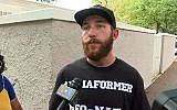 This screen grab taken from AFPTV video on August 12, 2018 shows ex-white supremacist Jason Downard being interviewed during a far-right rally at Lafayette Park opposite the White House August 12, 2018 in Washington, DC. (AFP  / Antoine BOYER)