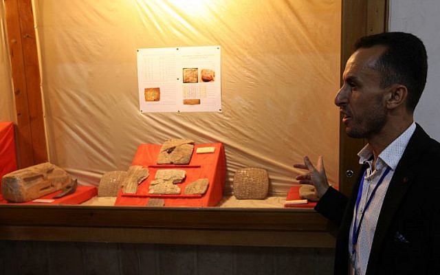 A museum employee guides a tour at the Idlib Museum after it reopened on August 13, 2018 in the northern Syrian city of Idlib. (AFP PHOTO / OMAR HAJ KADOUR) A museum employee guides a tour at the Idlib Museum after it reopened on August 13, 2018 in the northern Syrian city of Idlib. (AFP PHOTO / OMAR HAJ KADOUR)