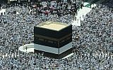 Muslim worshipers pray around the Kaaba, Islam's holiest shrine, at the Grand Mosque in Saudi Arabia's holy city of Mecca on August 16, 2018, prior to the start of the annual hajj pilgrimage in the holy city. (AFP/Ahmad Al-Rubaye)