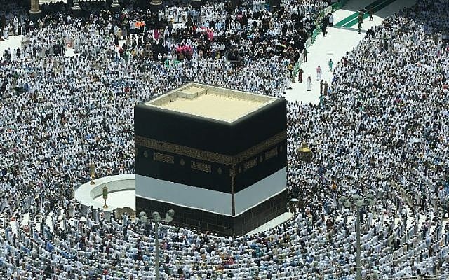 Muslim worshipers pray around the Kaaba, Islam's holiest shrine, at the Grand Mosque in Saudi Arabia's holy city of Mecca on August 16, 2018, prior to the start of the annual hajj pilgrimage in the holy city. (AFP/Ahmad Al-Rubaye) Muslim worshipers pray around the Kaaba, Islam's holiest shrine, at the Grand Mosque in Saudi Arabia's holy city of Mecca on August 16, 2018, prior to the start of the annual hajj pilgrimage in the holy city. (AFP/Ahmad Al-Rubaye)