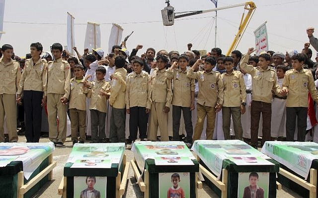 In this file photo taken on August 13, 2018 Yemeni children vent anger against Riyadh and Washington as they take part in a mass funeral in the northern Yemeni city of Saada, a stronghold of the Iran-backed Huthi rebels, for children killed in an air strike by the Saudi-led coalition last week. (AFP PHOTO / STRINGER) In this file photo taken on August 13, 2018 Yemeni children vent anger against Riyadh and Washington as they take part in a mass funeral in the northern Yemeni city of Saada, a stronghold of the Iran-backed Huthi rebels, for children killed in an air strike by the Saudi-led coalition last week. (AFP PHOTO / STRINGER)
