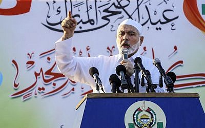 Hamas leader Ismail Haniyeh gives a speech on the first day of the Muslim Eid al-Adha holiday in Gaza City on August 21, 2018. (AFP Photo/Anas Baba)