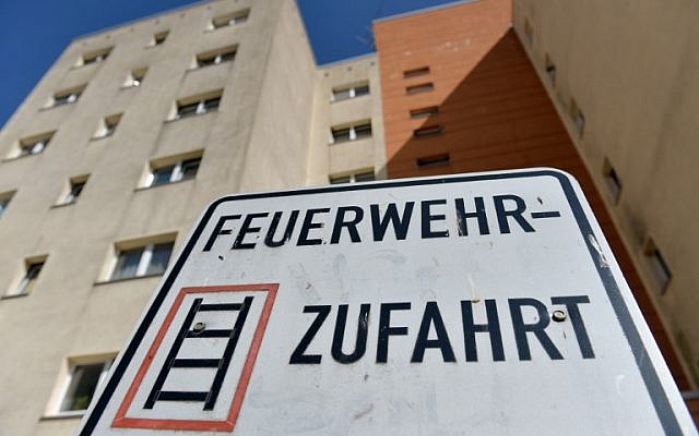 This picture taken on August 22, 2018 in Berlin shows the apartment block where German police commandos arrested a Russian suspected Islamist terrorist accused of having plotted an explosives attack in the country. (AFP/dpa/Paul Zinken) This picture taken on August 22, 2018 in Berlin shows the apartment block where German police commandos arrested a Russian suspected Islamist terrorist accused of having plotted an explosives attack in the country. (AFP/dpa/Paul Zinken)