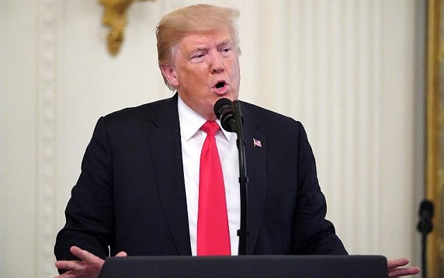 US President Donald Trump speaks at a ceremony to present Valerie Nessel, widow of Air Force Tech Sgt. John Chapman, with his Medal of Honor in the East Room of the White House on August 22, 2018. (AFP Photo/Mandel Ngan) US President Donald Trump speaks at a ceremony to present Valerie Nessel, widow of Air Force Tech Sgt. John Chapman, with his Medal of Honor in the East Room of the White House on August 22, 2018. (AFP Photo/Mandel Ngan)