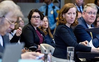 Jennifer G Newstead (C), lawyer of lawyer for the United States and representative of Iran Mohsen Mohebi (L) are pictured during the opening of case between Iran and the United States at the The International Court of Justice (ICJ) in the Hague, August 27, 2018.  (AFP PHOTO / ANP / Jerry Lampen)