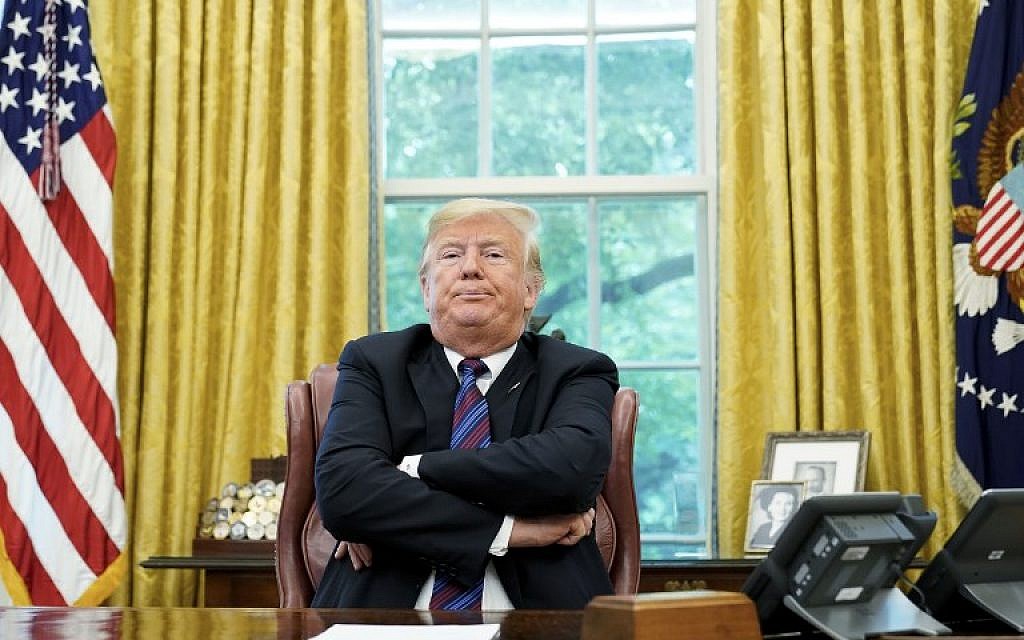 US President Donald Trump speaks to reporters in the Oval Office of the White House in Washington, DC on August 27, 2018.                          
(AFP/MANDEL NGAN)