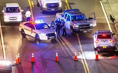 A heavy police presence remained into the night at the shooting outside Jacksonville Landing on August 26, 2018 in Jacksonville, Florida. (Mark Wallheiser/Getty Images/AFP)