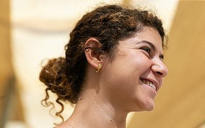 The gold Hellenistic-era earring unearthed in the City of David's Givati Parking Lot excavations belonged to an upper class man or woman in Jerusalem.  (Clara Amit, Israel Antiquities Authority)