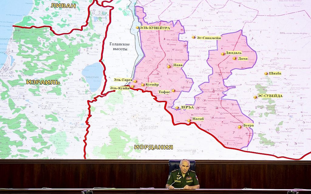 Col.-Gen. Sergei Rudskoy of the Russian Military General Staff speaks to the media as a screen shows the map of Israel, Jordan, Syria and Lebanon in Moscow, Russia, August 2, 2018. (AP Photo/Alexander Zemlianichenko, Pool)