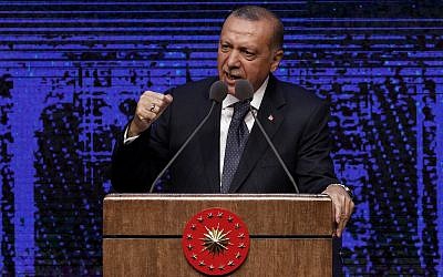 Turkey's President Recep Tayyip Erdogan announces plan of action for the first 100 days of his new presidency, in Ankara, Turkey, Friday, August 3, 2018. (AP/Burhan Ozbilici)