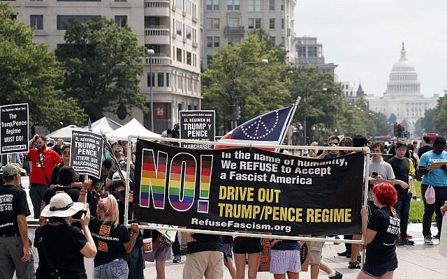 Protesters gather in Freedom Plaza with the US Capitol in the background, on the one year anniversary of Charlottesville's "Unite the Right" rally, Sunday, August 12, 2018, in Washington. (AP Photo/Alex Brandon) Protesters gather in Freedom Plaza with the US Capitol in the background, on the one year anniversary of Charlottesville's "Unite the Right" rally, Sunday, August 12, 2018, in Washington. (AP Photo/Alex Brandon)