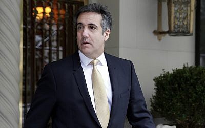 Michael Cohen, former personal lawyer to US President Donald Trump, leaves his apartment building, in New York, Tuesday, August 21, 2018. (AP Photo/Richard Drew)