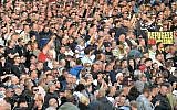 Protesters gather for a far-right protest in Chemnitz, Germany, August 27, 2018, after a man died and two others were injured, in an altercation between several people of "various nationalities," in the eastern German city of Chemnitz on Sunday. (AP Photo/Jens Meyer)