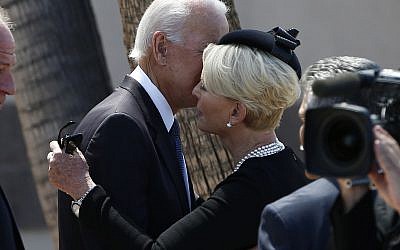 Cindy McCain, right, wife of Sen. John McCain, R-Ariz., gets a hug from former Vice President Joe Biden, left, after a memorial service for McCain at North Phoenix Baptist Church Thursday, Aug. 30, 2018, in Phoenix. (AP/Ross D. Franklin)