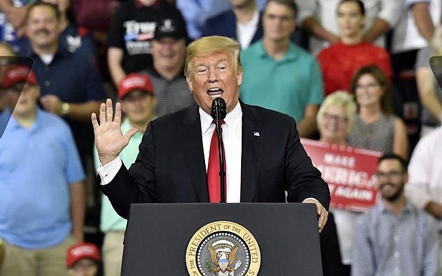 US President Donald Trump speaks to a group of supporters at the Ford Center in Evansville, Ind., Thursday, Aug. 30, 2018. (AP Photo/Timothy D. Easley) US President Donald Trump speaks to a group of supporters at the Ford Center in Evansville, Ind., Thursday, Aug. 30, 2018. (AP Photo/Timothy D. Easley)