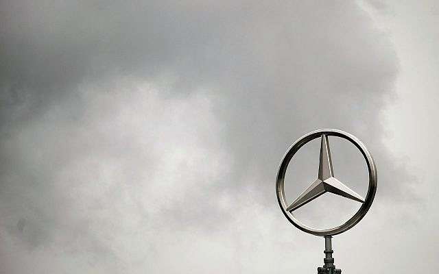 Dark clouds surround the Mercedes emblem on the roof of the headquarters of the Daimler AG in Stuttgart, Germany, on April 28, 2009. (AP Photo/Daniel Maurer) Dark clouds surround the Mercedes emblem on the roof of the headquarters of the Daimler AG in Stuttgart, Germany, on April 28, 2009. (AP Photo/Daniel Maurer)
