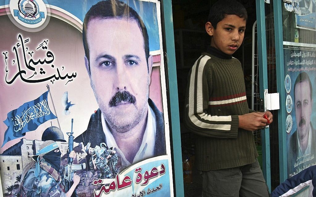 In this March 24, 2010 file photo a Palestinian youth walks out of a store covered with posters of of assassinated Mahmoud al-Mabhouh, one of the founders of Hamas military wing, near his family house in Beit Lahiya, northern Gaza Strip. (AP/Adel Hana) In this March 24, 2010 file photo a Palestinian youth walks out of a store covered with posters of of assassinated Mahmoud al-Mabhouh, one of the founders of Hamas military wing, near his family house in Beit Lahiya, northern Gaza Strip. (AP/Adel Hana)