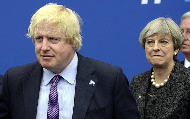 Then-British foreign secretary Boris Johnson (L) and then-British prime minister Theresa May in May 2017. (Thierry Charlier/Pool Photo via AP)