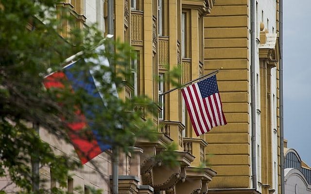 US and Russian flags hang at the U.S. Embassy in Moscow, Russia, Friday, July 28, 2017. (AP Photo/Alexander Zemlianichenko) US and Russian flags hang at the U.S. Embassy in Moscow, Russia, Friday, July 28, 2017. (AP Photo/Alexander Zemlianichenko)