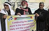 Refugees protest against the US for withholding $65 million from Palestinian aid programs, in front of the UNRWA offices in the Nusseirat refugee camp, central Gaza Strip, January 17, 2018.  (AP Photo/Adel Hana)