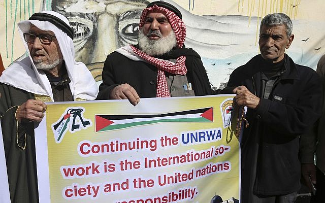 Refugees protest against the US for withholding $65 million from Palestinian aid programs, in front of the UNRWA offices in the Nusseirat refugee camp, central Gaza Strip, January 17, 2018. (AP Photo/Adel Hana) Refugees protest against the US for withholding $65 million from Palestinian aid programs, in front of the UNRWA offices in the Nusseirat refugee camp, central Gaza Strip, January 17, 2018. (AP Photo/Adel Hana)