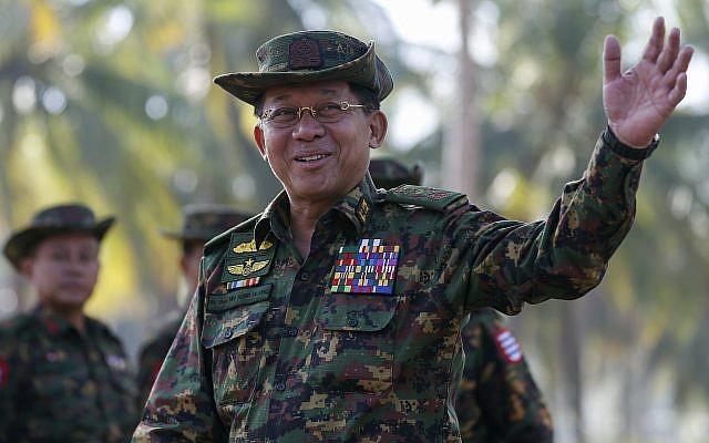 Myanmar military commander-in-chief Senior General Min Aung Hlaing gestures as he arrives to attend the second day of 'Sin Phyu Shin' joint military exercises, on February 3, 2018, in Ayeyarwaddy delta region, Myanmar. (Lynn Bo Bo/Pool Photo via AP) Myanmar military commander-in-chief Senior General Min Aung Hlaing gestures as he arrives to attend the second day of 'Sin Phyu Shin' joint military exercises, on February 3, 2018, in Ayeyarwaddy delta region, Myanmar. (Lynn Bo Bo/Pool Photo via AP)