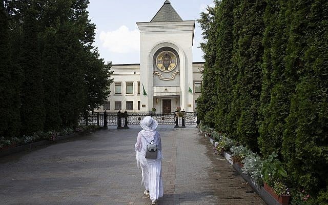 A woman walks toward the Russian Orthodox Church headquarters in the St. Daniel Monastery in Moscow, Russia, Aug. 3, 2018. (AP Photo/Pavel Golovkin) A woman walks toward the Russian Orthodox Church headquarters in the St. Daniel Monastery in Moscow, Russia, Aug. 3, 2018. (AP Photo/Pavel Golovkin)