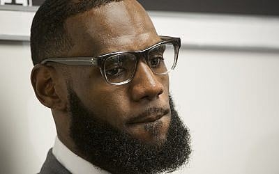 In this July 30, 2018 file photo, LeBron James listens to a question at a news conference after the opening ceremony for the I Promise School in Akron, Ohio. (AP Photo/Phil Long, File)