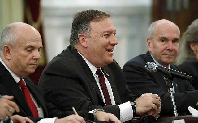 US Secretary of State Mike Pompeo, center, talks with Indonesian President Joko Widodo, unseen, during their meeting at Merdeka palace in Jakarta, Indonesia, Aug. 5, 2018. (Beawiharta/Pool Photo via AP) US Secretary of State Mike Pompeo, center, talks with Indonesian President Joko Widodo, unseen, during their meeting at Merdeka palace in Jakarta, Indonesia, Aug. 5, 2018. (Beawiharta/Pool Photo via AP)