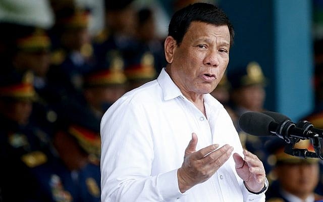 Philippine President Rodrigo Duterte gestures while addressing police force to mark the 117th Philippine National Police Service anniversary at Camp Crame in suburban Quezon city northeast of Manila, Philippines, on August 8, 2018. (AP Photo/Bullit Marquez) Philippine President Rodrigo Duterte gestures while addressing police force to mark the 117th Philippine National Police Service anniversary at Camp Crame in suburban Quezon city northeast of Manila, Philippines, on August 8, 2018. (AP Photo/Bullit Marquez)