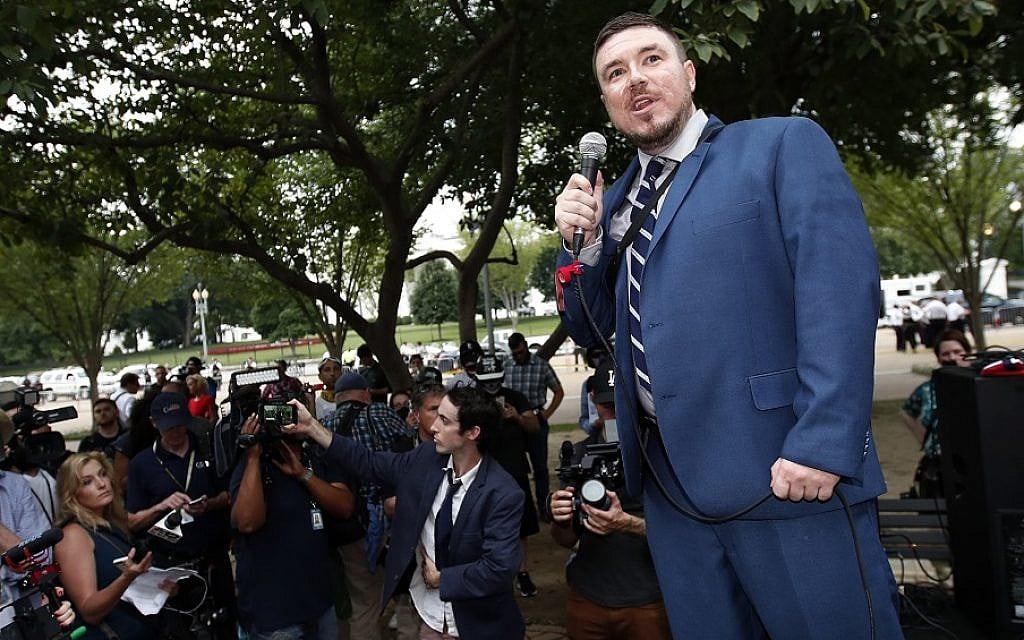 White nationalist Jason Kessler speaks at a rally near the White House on the one-year anniversary of the Charlottesville "Unite the Right" rally, Sunday, Aug. 12, 2018, in Washington. (AP Photo/Alex Brandon) White nationalist Jason Kessler speaks at a rally near the White House on the one-year anniversary of the Charlottesville "Unite the Right" rally, Sunday, Aug. 12, 2018, in Washington. (AP Photo/Alex Brandon)