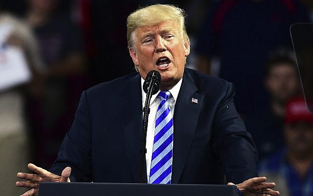 US President Donald Trump speaks during a rally August 21, 2018, at the Civic Center in Charleston West Virginia. (AP Photo/Tyler Evert) US President Donald Trump speaks during a rally August 21, 2018, at the Civic Center in Charleston West Virginia. (AP Photo/Tyler Evert)