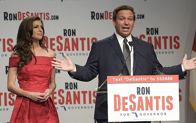 Florida Republican gubernatorial candidate Ron DeSantis, right, speaks to supporters with his wife Casey (l) at an election party after winning the Republican primary Tuesday, Aug. 28, 2018, in Orlando, Florida. (AP Photo/Phelan M. Ebenhack) Florida Republican gubernatorial candidate Ron DeSantis, right, speaks to supporters with his wife Casey (l) at an election party after winning the Republican primary Tuesday, Aug. 28, 2018, in Orlando, Florida. (AP Photo/Phelan M. Ebenhack)