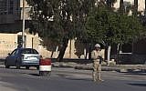 An Egyptian soldier mans a checkpoint in el-Arish, 290 kilometers (180 miles) east of Cairo, North Sinai, Egypt, January 31, 2015 (AP Photo)
