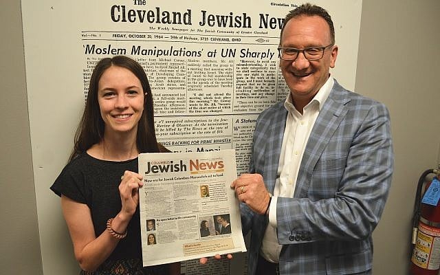 Columbus Bureau Chief Amanda Koehn and Publisher and CEO Kevin S. Adelstein hold up the inaugural issue of the new biweekly Columbus Jewish News, which debuted August 9. (Cleveland Jewish News via JTA) Columbus Bureau Chief Amanda Koehn and Publisher and CEO Kevin S. Adelstein hold up the inaugural issue of the new biweekly Columbus Jewish News, which debuted August 9. (Cleveland Jewish News via JTA)