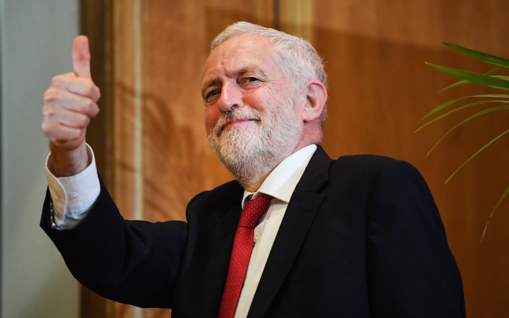 UK Labour Party leader Jeremy Corbyn leaves the stage after delivering a speech at Queens University in Belfast, Northern Ireland, May 24, 2018. (Jeff J. Mitchell/Getty Images via JTA) UK Labour Party leader Jeremy Corbyn leaves the stage after delivering a speech at Queens University in Belfast, Northern Ireland, May 24, 2018. (Jeff J. Mitchell/Getty Images via JTA)