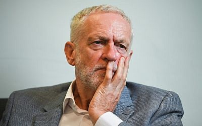 Illustrative: Jeremy Corbyn meets with asylum seekers in Glasgow, Scotland, August 22, 2018. (Jeff J Mitchell/Getty Images via JTA)