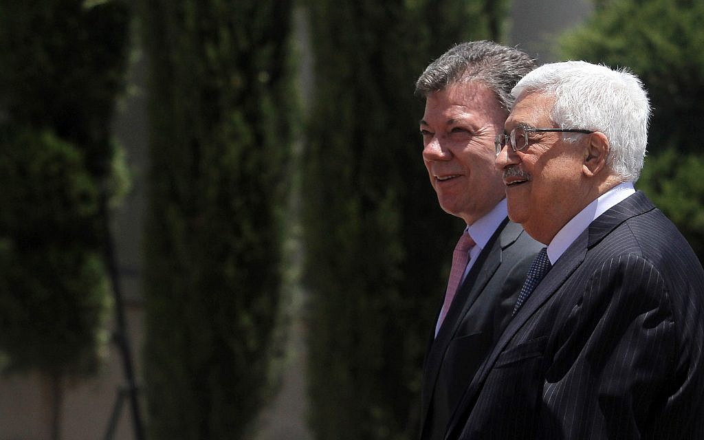 Colombian President Juan Manuel Santos (C) with Palestinian Authority President Mahmud Abbas during an official welcoming ceremony in Ramallah, June 4, 2013. (Issam Rimawi/Flash90) Colombian President Juan Manuel Santos (C) with Palestinian Authority President Mahmud Abbas during an official welcoming ceremony in Ramallah, June 4, 2013. (Issam Rimawi/Flash90)
