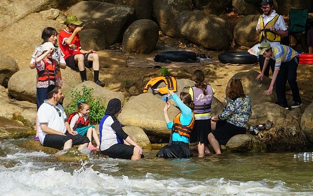 Illustrative: Israelis enjoy kayaking in the Jordan River in northern Israel. (Basal Awidat/Flash90) Illustrative: Israelis enjoy kayaking in the Jordan River in northern Israel. (Basal Awidat/Flash90)