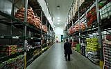 Illustrative photo of a kashrut supervisor in a warehouse. March 20, 2016. (Yaakov Naumi/FLASH90)