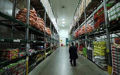 Illustrative photo of a kashrut supervisor in a warehouse. March 20, 2016. (Yaakov Naumi/FLASH90)