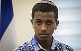 Sintayehu Shafrao, an Ethiopian Jew who participated in the 2018 International Bible Quiz, is seen during a ceremony at the Interior Ministry in Jerusalem on April 16, 2018. (Yonatan Sindel/Flash90)