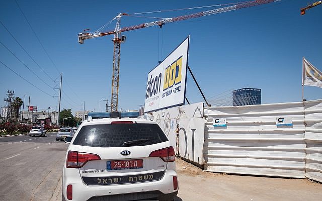 Illustrative: The scene of a construction site in Petah Tikvah, where three workers were seriously injured in a falling accident, on June 14, 2018. (Roy Alima/Flash90) Illustrative: The scene of a construction site in Petah Tikvah, where three workers were seriously injured in a falling accident, on June 14, 2018. (Roy Alima/Flash90)