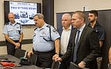 Public Security Minister Gilad Erdan, right, and Israeli chief of Police Roni Alsheich, second left,  at an inauguration ceremony for a newly opened police control center in Nazareth on June 21, 2018. (Meir Vaaknin/FLASH90)